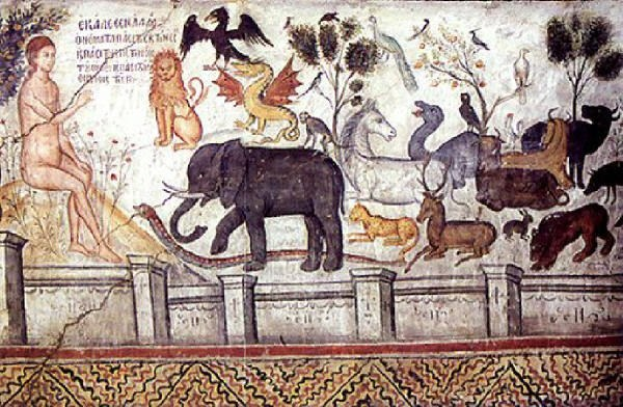 Fresko auf einer Wand eines Pompeji-Hauses, das eine Frau in einem wallenden Kleid mit ausgestreckten Armen zeigt, umgeben von einem Löwen, Giraffe, Zebra, Hippopotamus, grünen Bäumen und fliegenden Vögeln, mit Schrifttext darunter.
