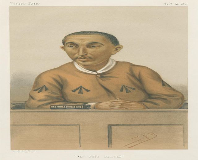 Ein Mann in einem weißen Hemd und dunklen Hosen sitzt an einem Tisch mit gefalteten Händen, sein Gesichtsausdruck ernst, mit dem Text "Die Rasenbetrug" unten.