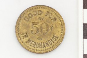 Eine Goldmünze mit der Aufschrift "Gültig für 50 im Handel" auf einem weißen Hintergrund.